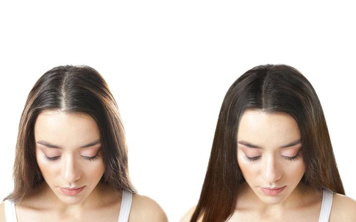 Woman with voluminous hair after hair volume treatment